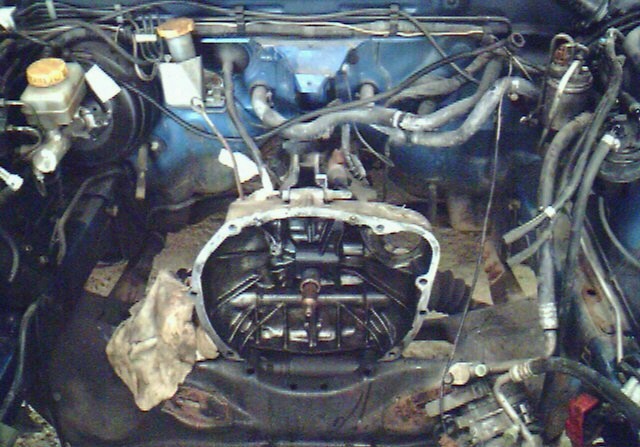 The (empty) engine bay of the donor.